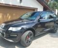 Черный Фольксваген Туарег, объемом двигателя 2.97 л и пробегом 350 тыс. км за 14000 $, фото 1 на Automoto.ua
