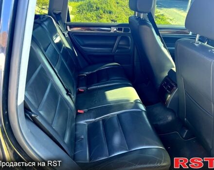 Фольксваген Туарег 2007 у Харкові на Automoto.ua Чорний Фольксваген Туарег, об'ємом двигуна 3 л та пробігом 240 тис. км за 8500 $, фото 7 на Automoto.ua