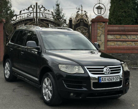 Черный Фольксваген Туарег, объемом двигателя 4.9 л и пробегом 340 тыс. км за 7900 $, фото 2 на Automoto.ua