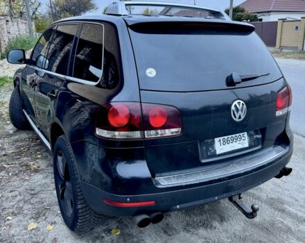 Черный Фольксваген Туарег, объемом двигателя 3 л и пробегом 332 тыс. км за 7048 $, фото 1 на Automoto.ua