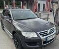 Чорний Фольксваген Туарег, об'ємом двигуна 3 л та пробігом 258 тис. км за 10500 $, фото 1 на Automoto.ua