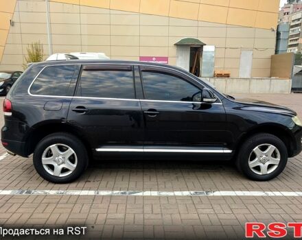 Чорний Фольксваген Туарег, об'ємом двигуна 3 л та пробігом 198 тис. км за 11300 $, фото 5 на Automoto.ua