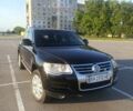 Черный Фольксваген Туарег, объемом двигателя 3 л и пробегом 280 тыс. км за 10800 $, фото 1 на Automoto.ua