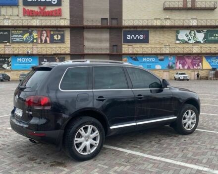 Чорний Фольксваген Туарег, об'ємом двигуна 3 л та пробігом 207 тис. км за 12000 $, фото 5 на Automoto.ua