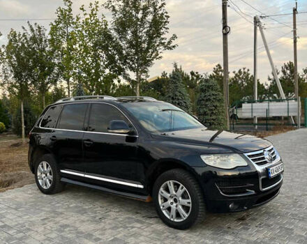 Черный Фольксваген Туарег, объемом двигателя 4.92 л и пробегом 340 тыс. км за 11000 $, фото 2 на Automoto.ua