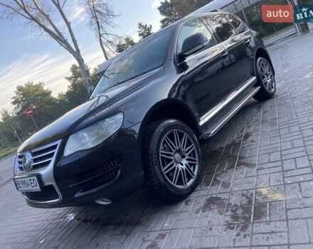 Черный Фольксваген Туарег, объемом двигателя 3 л и пробегом 200 тыс. км за 13800 $, фото 1 на Automoto.ua