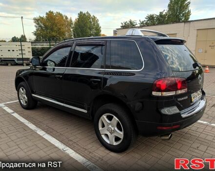 Чорний Фольксваген Туарег, об'ємом двигуна 3 л та пробігом 198 тис. км за 11300 $, фото 3 на Automoto.ua