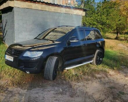 Черный Фольксваген Туарег, объемом двигателя 3 л и пробегом 275 тыс. км за 9500 $, фото 2 на Automoto.ua