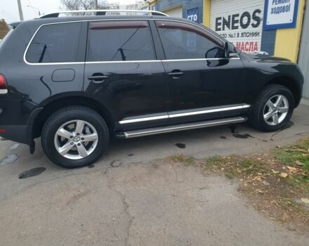 Чорний Фольксваген Туарег, об'ємом двигуна 3 л та пробігом 205 тис. км за 12000 $, фото 21 на Automoto.ua