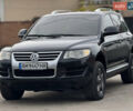 Черный Фольксваген Туарег, объемом двигателя 3 л и пробегом 333 тыс. км за 9950 $, фото 2 на Automoto.ua