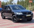 Черный Фольксваген Туарег, объемом двигателя 3 л и пробегом 287 тыс. км за 9500 $, фото 1 на Automoto.ua