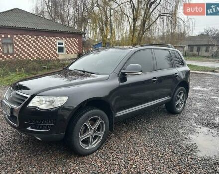 Чорний Фольксваген Туарег, об'ємом двигуна 2.46 л та пробігом 174 тис. км за 11000 $, фото 1 на Automoto.ua