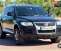 Фольксваген Туарег 2007 у Житомирі на Automoto.ua Чорний Фольксваген Туарег, об'ємом двигуна 2.97 л та пробігом 329 тис. км за 10600 $, фото 7 на Automoto.ua