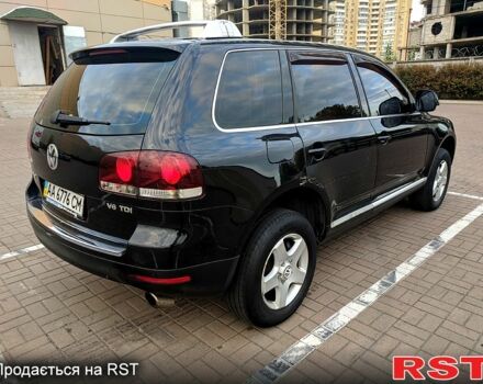 Чорний Фольксваген Туарег, об'ємом двигуна 3 л та пробігом 198 тис. км за 11300 $, фото 4 на Automoto.ua