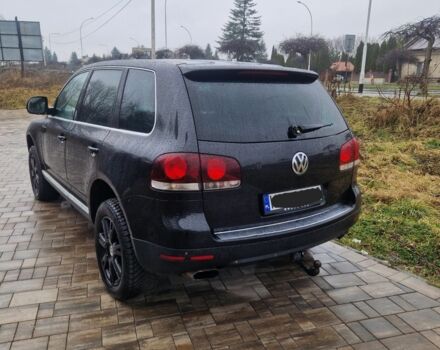 Чорний Фольксваген Туарег, об'ємом двигуна 3 л та пробігом 250 тис. км за 6648 $, фото 6 на Automoto.ua