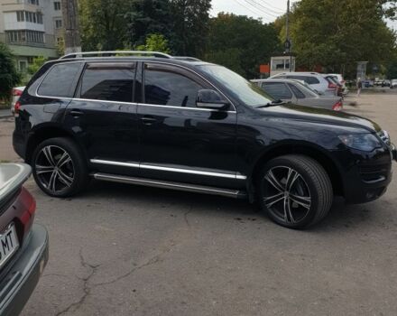 Чорний Фольксваген Туарег, об'ємом двигуна 3 л та пробігом 205 тис. км за 12000 $, фото 9 на Automoto.ua