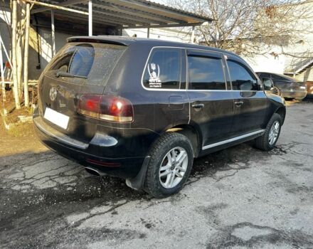 Чорний Фольксваген Туарег, об'ємом двигуна 3 л та пробігом 335 тис. км за 8499 $, фото 3 на Automoto.ua