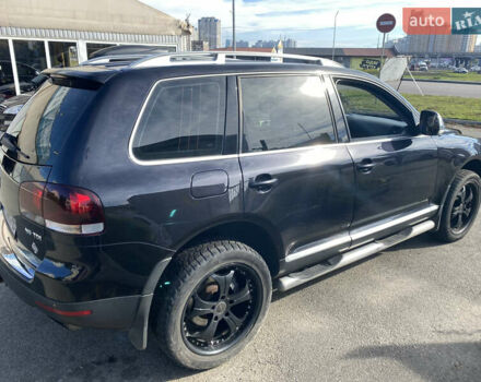 Черный Фольксваген Туарег, объемом двигателя 3 л и пробегом 240 тыс. км за 13000 $, фото 5 на Automoto.ua