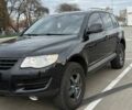 Черный Фольксваген Туарег, объемом двигателя 2.97 л и пробегом 263 тыс. км за 12500 $, фото 1 на Automoto.ua