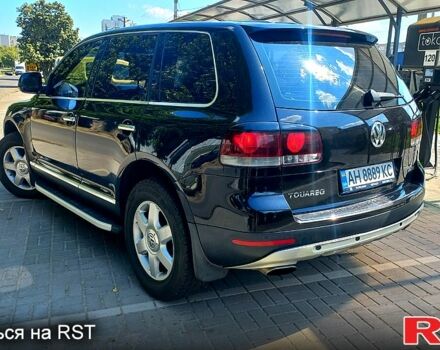 Чорний Фольксваген Туарег, об'ємом двигуна 3 л та пробігом 292 тис. км за 11500 $, фото 5 на Automoto.ua