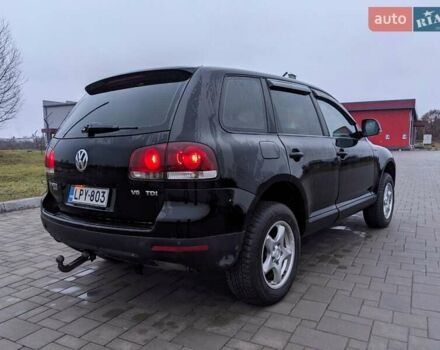 Черный Фольксваген Туарег, объемом двигателя 3 л и пробегом 305 тыс. км за 5850 $, фото 1 на Automoto.ua