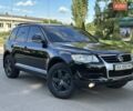 Чорний Фольксваген Туарег, об'ємом двигуна 3 л та пробігом 251 тис. км за 10699 $, фото 59 на Automoto.ua