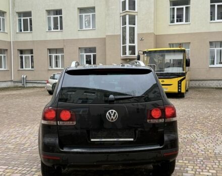 Чорний Фольксваген Туарег, об'ємом двигуна 3 л та пробігом 300 тис. км за 6490 $, фото 3 на Automoto.ua