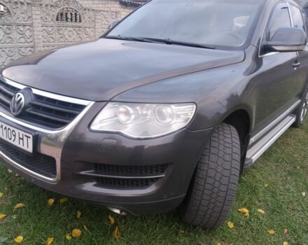 Черный Фольксваген Туарег, объемом двигателя 3 л и пробегом 300 тыс. км за 9300 $, фото 1 на Automoto.ua