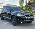 Чорний Фольксваген Туарег, об'ємом двигуна 3 л та пробігом 251 тис. км за 10699 $, фото 56 на Automoto.ua