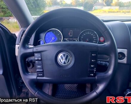 Чорний Фольксваген Туарег, об'ємом двигуна 3 л та пробігом 297 тис. км за 11777 $, фото 7 на Automoto.ua