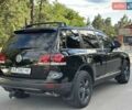 Чорний Фольксваген Туарег, об'ємом двигуна 3 л та пробігом 251 тис. км за 10699 $, фото 3 на Automoto.ua