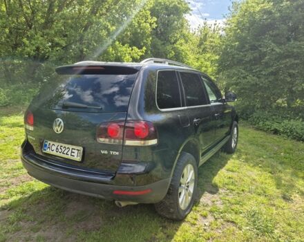 Черный Фольксваген Туарег, объемом двигателя 3 л и пробегом 372 тыс. км за 11000 $, фото 1 на Automoto.ua