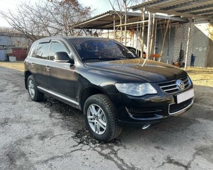 Чорний Фольксваген Туарег, об'ємом двигуна 3 л та пробігом 335 тис. км за 8499 $, фото 1 на Automoto.ua