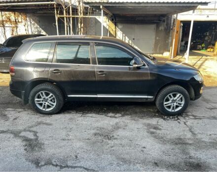 Чорний Фольксваген Туарег, об'ємом двигуна 3 л та пробігом 335 тис. км за 8499 $, фото 2 на Automoto.ua