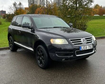 Черный Фольксваген Туарег, объемом двигателя 3 л и пробегом 280 тыс. км за 4900 $, фото 1 на Automoto.ua