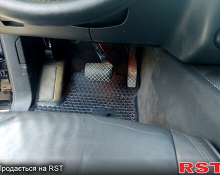 Чорний Фольксваген Туарег, об'ємом двигуна 3 л та пробігом 297 тис. км за 11777 $, фото 6 на Automoto.ua