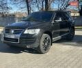 Черный Фольксваген Туарег, объемом двигателя 4.2 л и пробегом 286 тыс. км за 8999 $, фото 54 на Automoto.ua