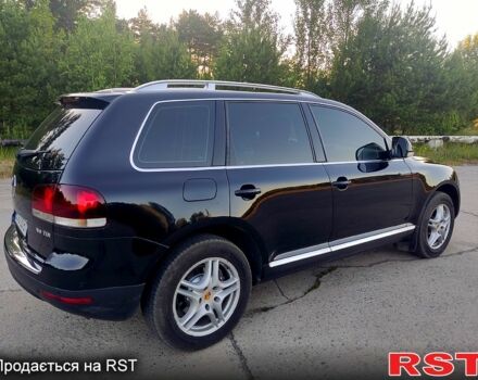 Чорний Фольксваген Туарег, об'ємом двигуна 3 л та пробігом 297 тис. км за 11777 $, фото 1 на Automoto.ua