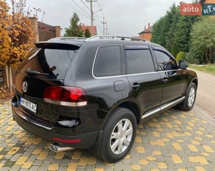 Черный Фольксваген Туарег, объемом двигателя 3 л и пробегом 360 тыс. км за 9800 $, фото 6 на Automoto.ua