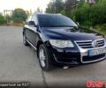 Чорний Фольксваген Туарег, об'ємом двигуна 3 л та пробігом 297 тис. км за 11777 $, фото 1 на Automoto.ua