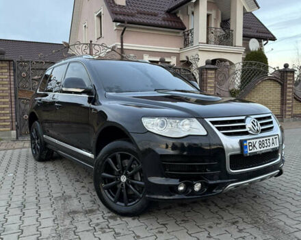 Черный Фольксваген Туарег, объемом двигателя 3 л и пробегом 217 тыс. км за 13450 $, фото 1 на Automoto.ua