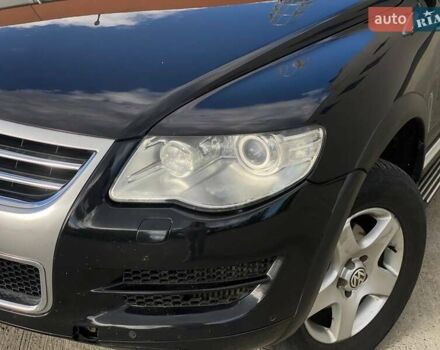 Черный Фольксваген Туарег, объемом двигателя 2.46 л и пробегом 296 тыс. км за 10290 $, фото 1 на Automoto.ua