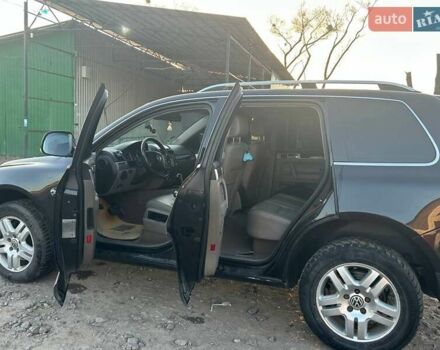 Чорний Фольксваген Туарег, об'ємом двигуна 3 л та пробігом 283 тис. км за 12200 $, фото 4 на Automoto.ua