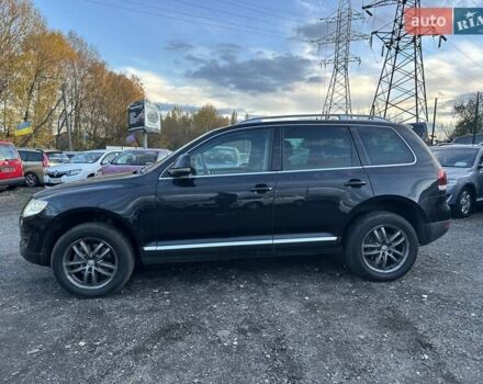 Чорний Фольксваген Туарег, об'ємом двигуна 3 л та пробігом 340 тис. км за 10900 $, фото 14 на Automoto.ua