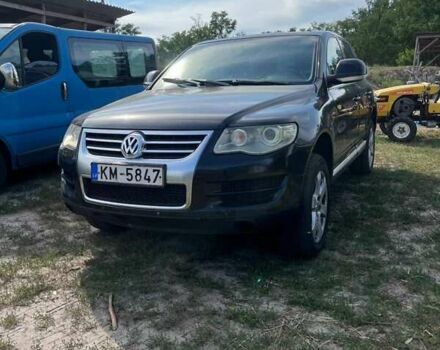 Черный Фольксваген Туарег, объемом двигателя 3 л и пробегом 410 тыс. км за 8300 $, фото 4 на Automoto.ua