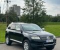 Черный Фольксваген Туарег, объемом двигателя 3 л и пробегом 281 тыс. км за 4999 $, фото 1 на Automoto.ua
