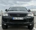 Черный Фольксваген Туарег, объемом двигателя 3 л и пробегом 263 тыс. км за 12500 $, фото 1 на Automoto.ua