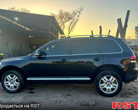 Черный Фольксваген Туарег, объемом двигателя 3 л и пробегом 283 тыс. км за 12300 $, фото 1 на Automoto.ua