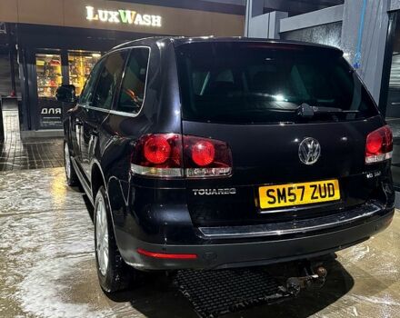 Черный Фольксваген Туарег, объемом двигателя 3 л и пробегом 340 тыс. км за 4500 $, фото 1 на Automoto.ua