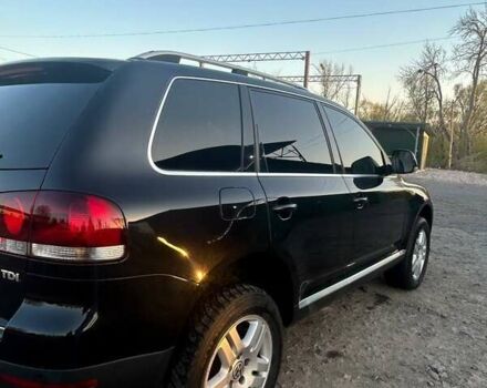 Чорний Фольксваген Туарег, об'ємом двигуна 3 л та пробігом 283 тис. км за 12200 $, фото 5 на Automoto.ua